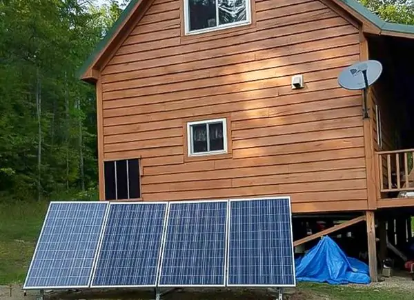 off grid home with small solar panels