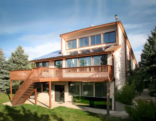 South face glazing, 4.7 kw PV on roof, SolarSheat at bottom sidewalk, Smart home Environmental computer with weather station on roof to operate home. Energy Star rated.