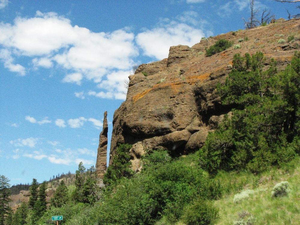 chimney rock a rock formation or hoodoo on the road from cody wy to yellowstone east entrance, buffalo bill scenic byway | canyon real estate