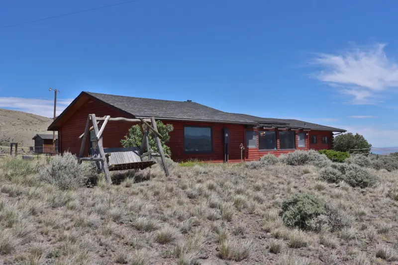 CODY WYOMING LOG HOME NEXT TO BLM #38