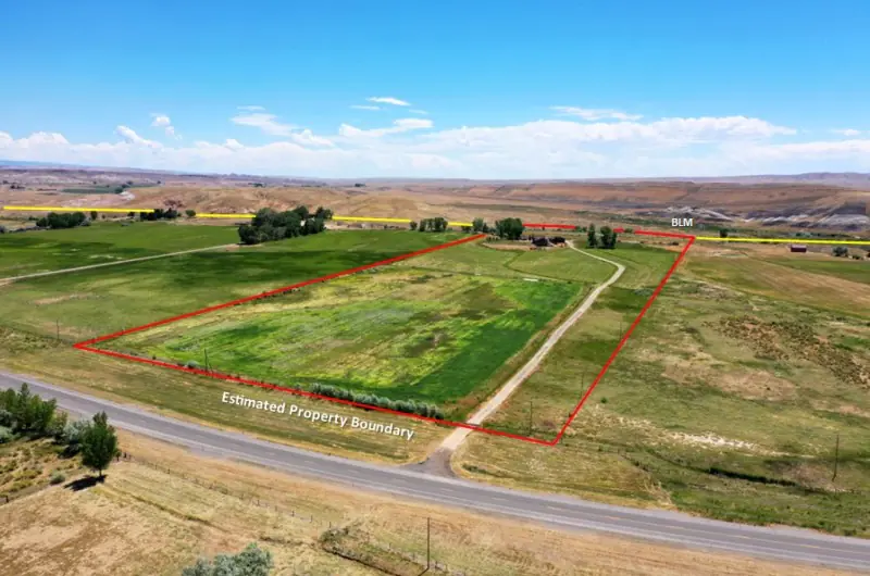 GREYBULL WYOMING LOG SIDED HOME ON 40 ACRES #100
